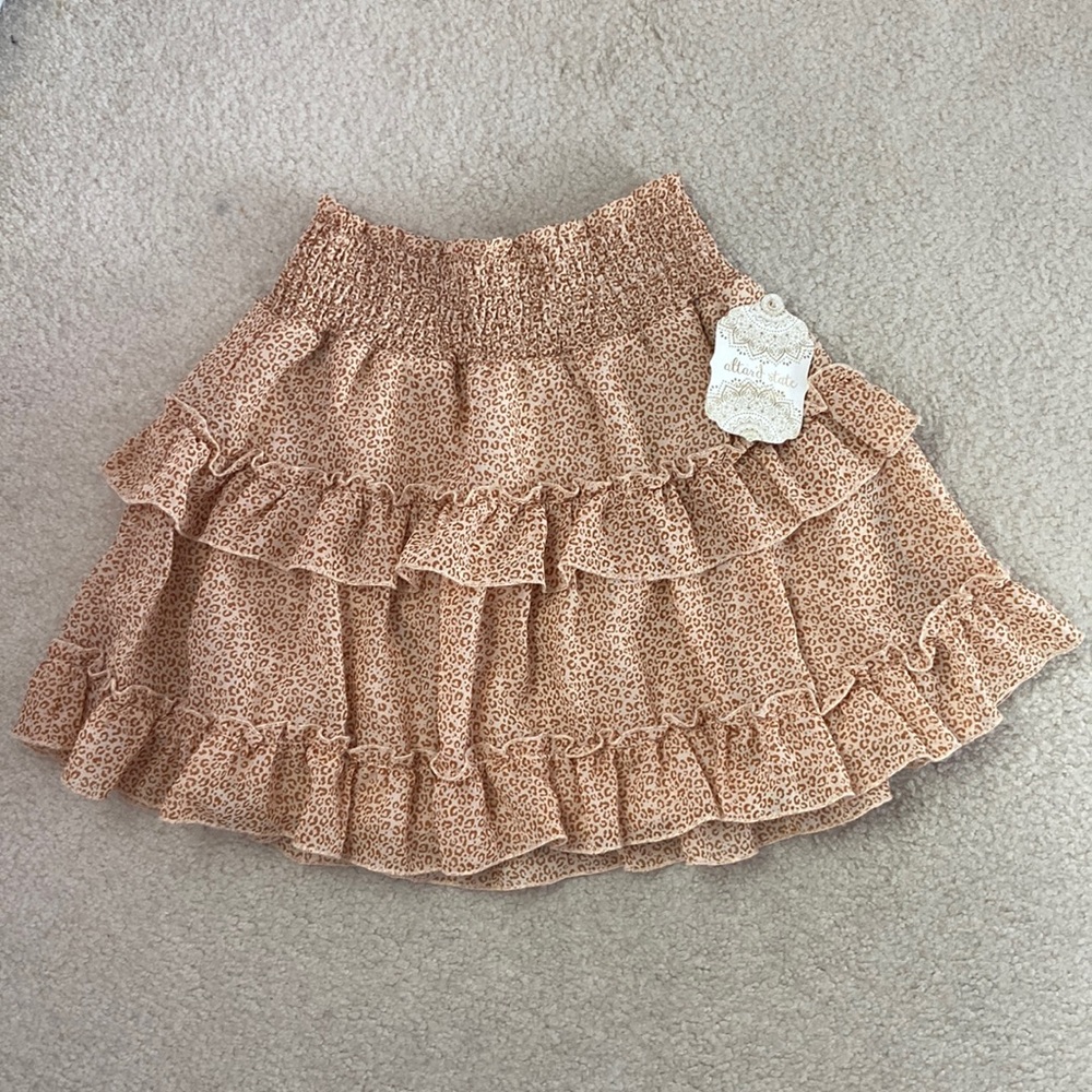 Altar’d State tiered ruffle cheetah print mini skirt in cream/tan
